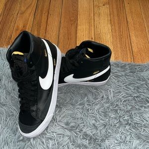 Black blue and white Nike blazer high tops